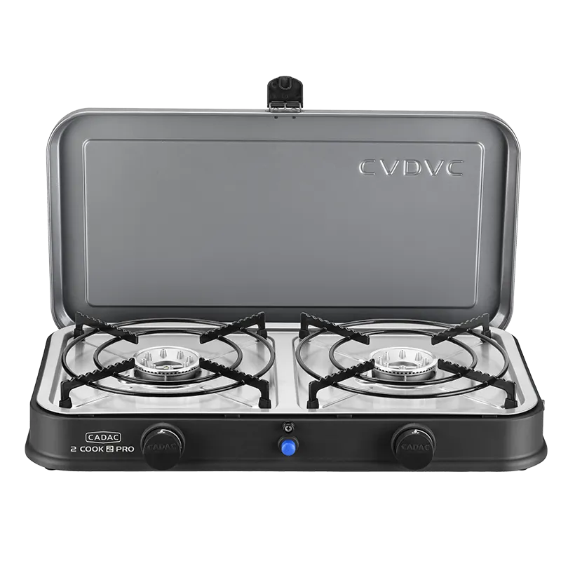 Portable gas stove with two burners and a black lid on a white background