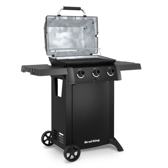Black portable grill with an open lid on a white background