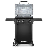 Black barbecue grill with an open lid on a white background