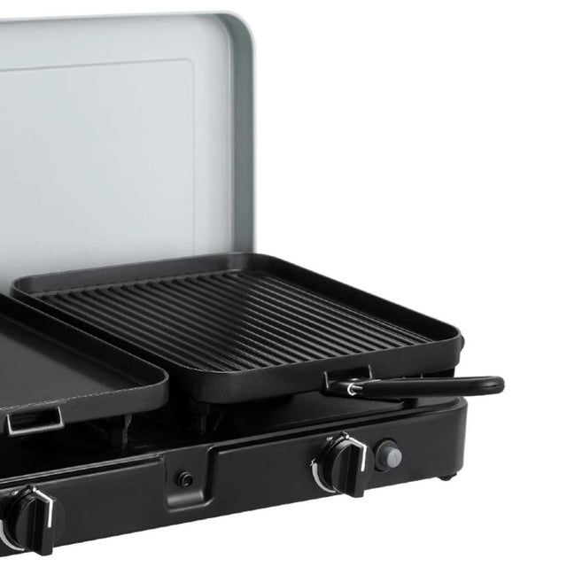 Cadac 2 Cook 3 Ribbed Plate is black and made of cast aluminum with a green grill ceramic non-stick coating.
